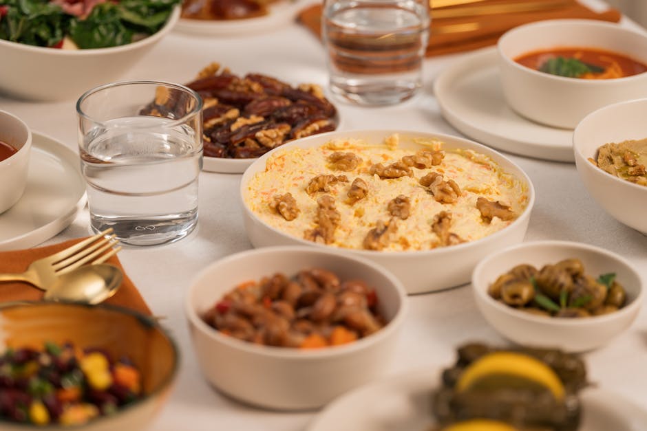 A table set for Iftar featuring an assortment of traditional dishes and drinks, perfect for Ramadan.